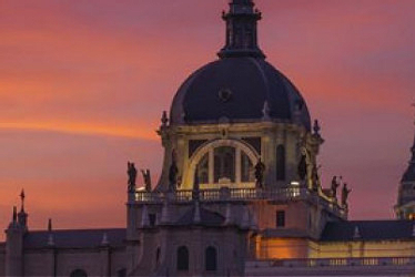 Madrid Royal Palace rooftop silhouette at dusk, Spain