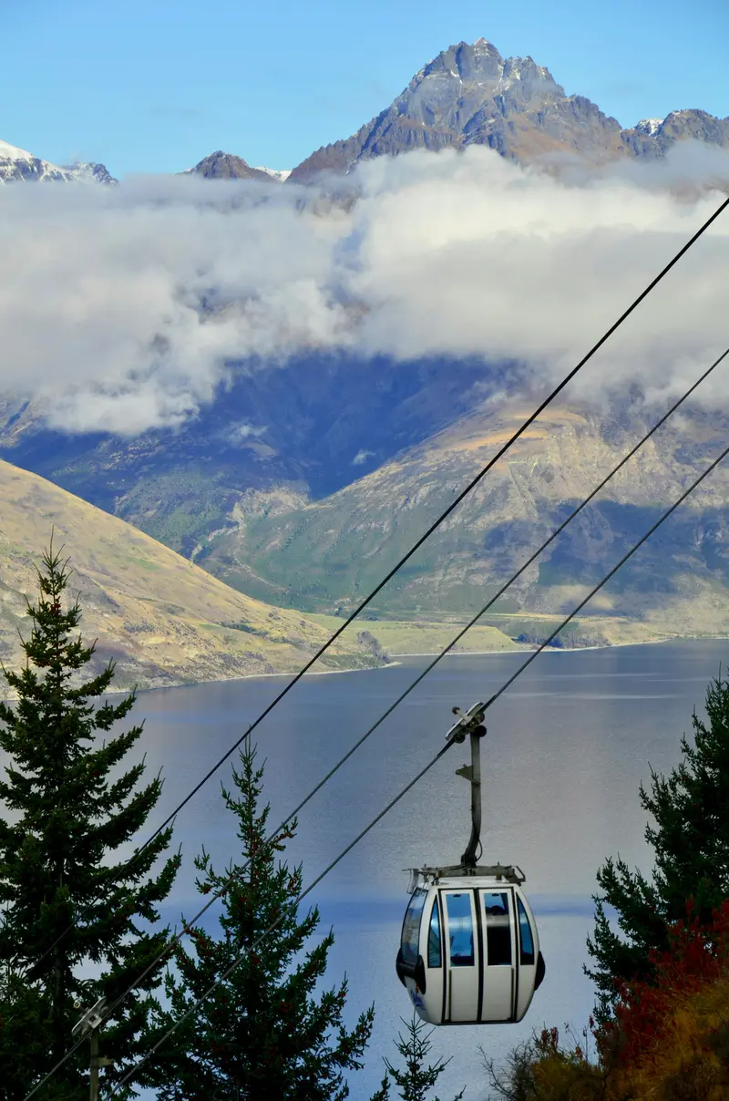 Queenstown Skyline gondola overlooking Lake Wakatipu with The Remarkables mountain range, New Zealand